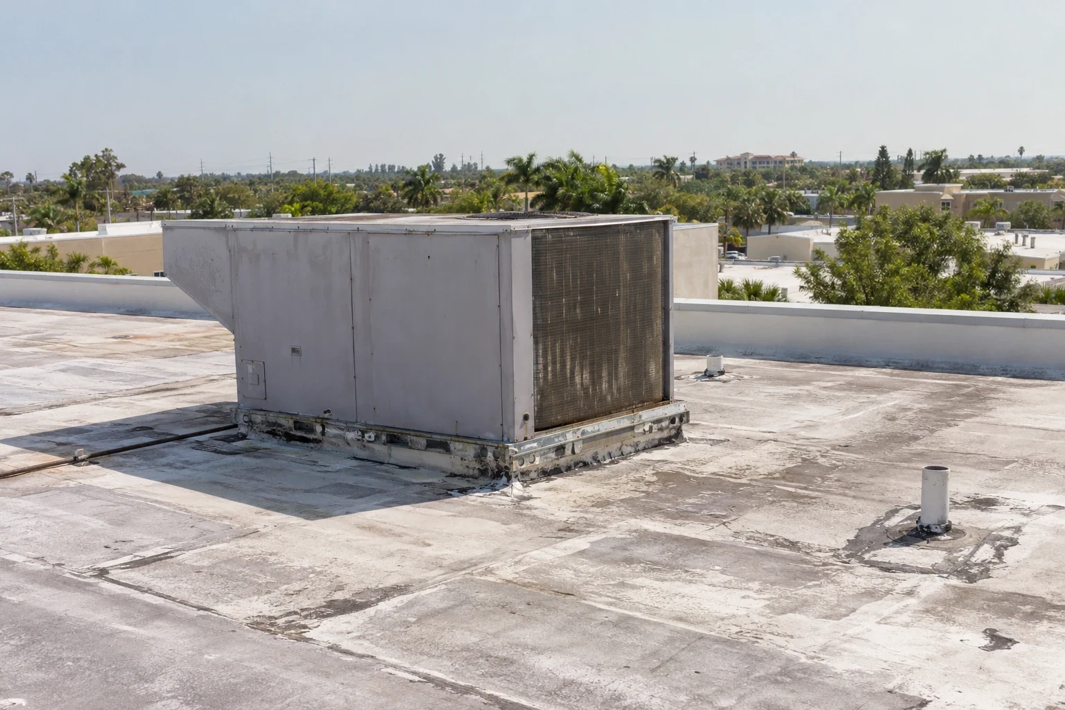 Occupied Commercial Building Reroofing in Missouri City, TX